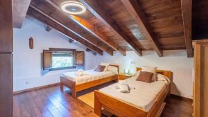 A bed or beds in a room at Casa La Buhardilla del Gastor by Ruralidays Még 33 kép
