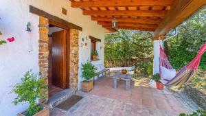 A garden outside Casa La Buhardilla del Gastor by Ruralidays