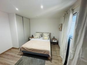 Postel nebo postele na pokoji v ubytování L'Aiglon Bylitis