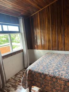 Postel nebo postele na pokoji v ubytování Monteverde Monkey Hostel