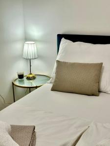 Postel nebo postele na pokoji v ubytování Apartman Obala deLuxe