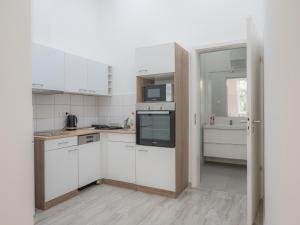 Kuchyň nebo kuchyňský kout v ubytování Luxury apartment in the central