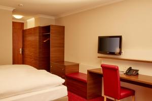 TV a/nebo společenská místnost v ubytování H+ Hotel & SPA Engelberg