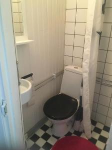 Ett badrum på Stockholm B&B Cottage