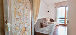 Ένα ή περισσότερα κρεβάτια σε δωμάτιο στο Nido IN montagna +6 φωτογραφίες