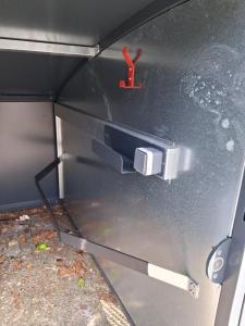 a door of a car with a red x on it at Chambre dans le centre historique in Pont-Audemer +8 photos