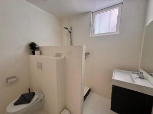 Baðherbergi á Boutique Hotel & apartments JT Curaçao