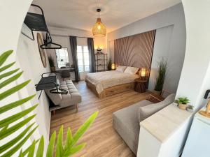 Postel nebo postele na pokoji v ubytování aeolian blu 1