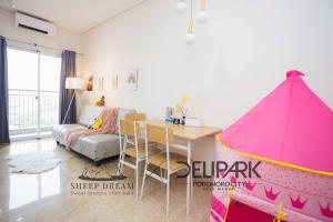a room with a table and a pink tent at SheepDream 17BC DeliparkMall 2Bedroom, 1Bathroom in Medan