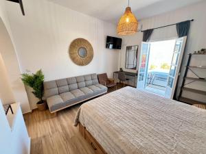 Postel nebo postele na pokoji v ubytování aeolian blu 7