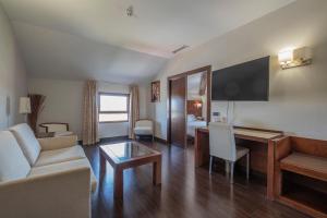 TV a/nebo společenská místnost v ubytování Hotel Hidalgo