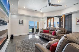 a living room with two couches and a couch at Sans Souci Unit 309 in Pensacola Beach