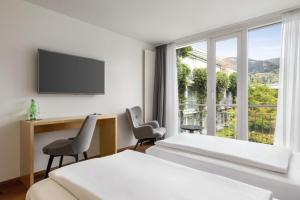 TV/trung tâm giải trí tại Vienna House by Wyndham Martinspark Dornbirn