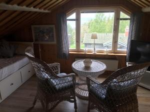 TV a/nebo společenská místnost v ubytování Augustas Bed & Breakfast