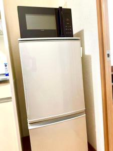 Majoituspaikan 鹿鸣新荣 keittiö tai keittotila