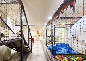 Cama ou camas em um quarto em Chocoland Hotel Gramado
