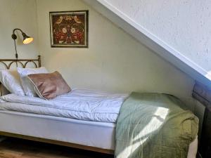 Postel nebo postele na pokoji v ubytování Ranch Mörby