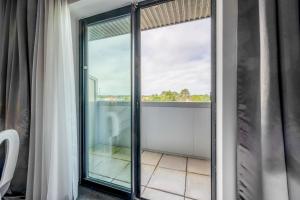 Balkón nebo terasa v ubytování Comfort Aparthotel Bassin d'Arcachon
