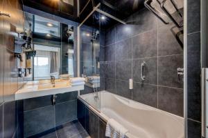 Koupelna v ubytování Comfort Aparthotel Bassin d'Arcachon