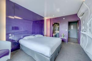 Postel nebo postele na pokoji v ubytování Comfort Aparthotel Bassin d'Arcachon