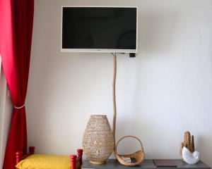 TV a/nebo společenská místnost v ubytování Anse marcel superbe studio