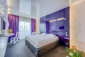 Postel nebo postele na pokoji v ubytování Comfort Aparthotel Bassin d'Arcachon