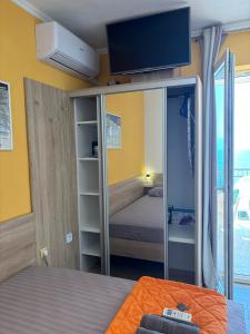 Postel nebo postele na pokoji v ubytování Apartments PEHAR