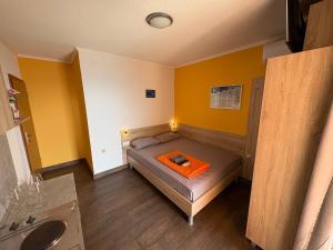 Postel nebo postele na pokoji v ubytování Apartments PEHAR