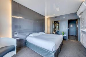 Postel nebo postele na pokoji v ubytování Comfort Aparthotel Bassin d'Arcachon