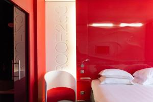 Postel nebo postele na pokoji v ubytování Comfort Aparthotel Bassin d'Arcachon