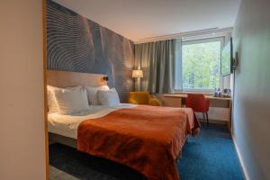 Postel nebo postele na pokoji v ubytování ProfilHotels Aveny + 37 fotografií