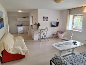 Kuchyň nebo kuchyňský kout v ubytování Szczycionek Apartament4you