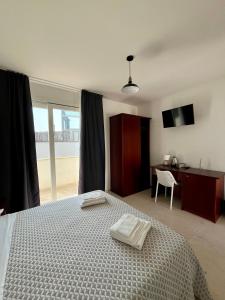 Letto o letti in una camera di Rooms del Moro