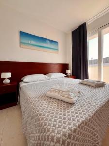 Letto o letti in una camera di Rooms del Moro