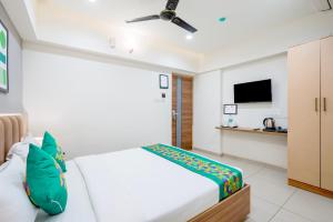Postel nebo postele na pokoji v ubytování Treebo Nestlay Rooms Whitefield
