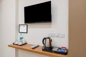 TV a/nebo společenská místnost v ubytování Treebo Nestlay Rooms Whitefield