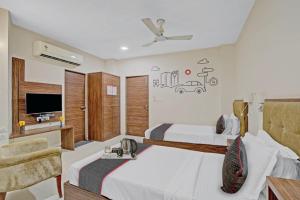 Postel nebo postele na pokoji v ubytování Hotel TELA Suite Near IGI AIrport Delhi