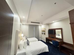 Postel nebo postele na pokoji v ubytování Hotel TELA Suite Near IGI AIrport Delhi