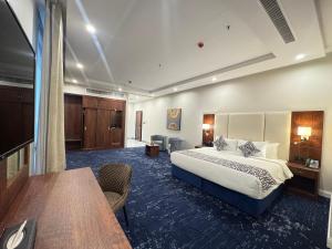 Postel nebo postele na pokoji v ubytování Hotel TELA Suite Near IGI AIrport Delhi