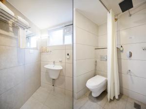 Koupelna v ubytování Treebo Nestlay Rooms Whitefield
