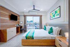 Postel nebo postele na pokoji v ubytování Treebo Nestlay Rooms Whitefield