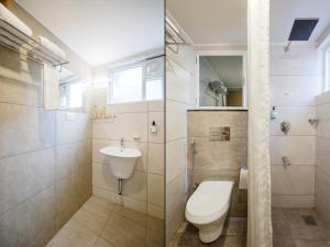 Koupelna v ubytování Treebo Nestlay Rooms Whitefield