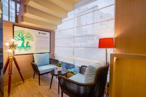 Posezení v ubytování Treebo Nestlay Rooms Whitefield