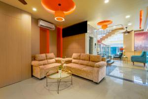 Posezení v ubytování Treebo Nestlay Rooms Whitefield