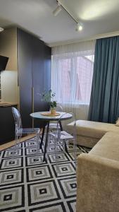 Posedenie v ubytovaní Black Room Apartment