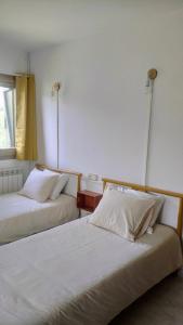 Postel nebo postele na pokoji v ubytování Casa Irama - Casa rural para grupos cerca de Aínsa - Pirineo Aragonés