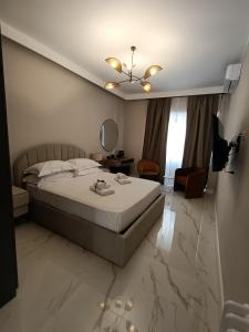 a hotel room with a bed and a mirror at Luxury Rome Vatican's Garden in Rome +52 photos