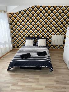 Ένα ή περισσότερα κρεβάτια σε δωμάτιο στο Studio 23m2 5mn gare 3 couchages