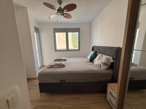 En eller flere senge i et værelse på Hana Apartments + 15 billeder