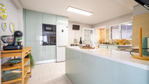 Kuchyň nebo kuchyňský kout v ubytování Family House